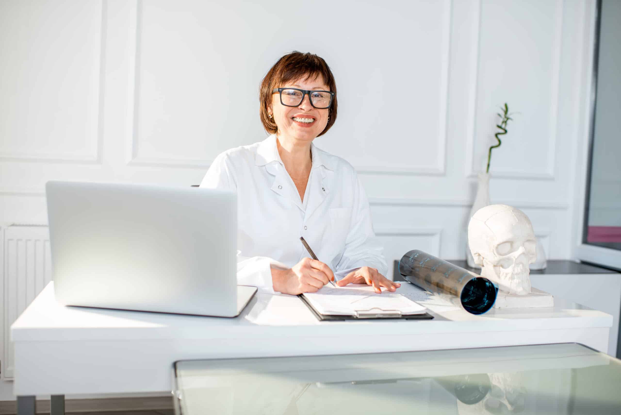 Senior woman doctor in the office