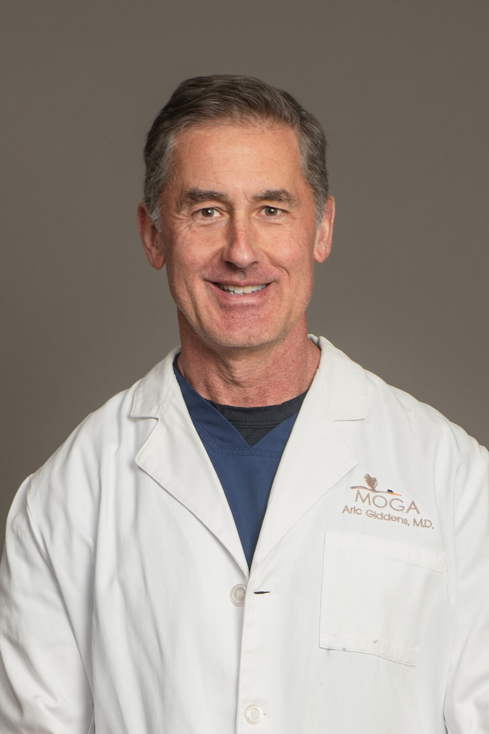 Aric Giddens, M.D.